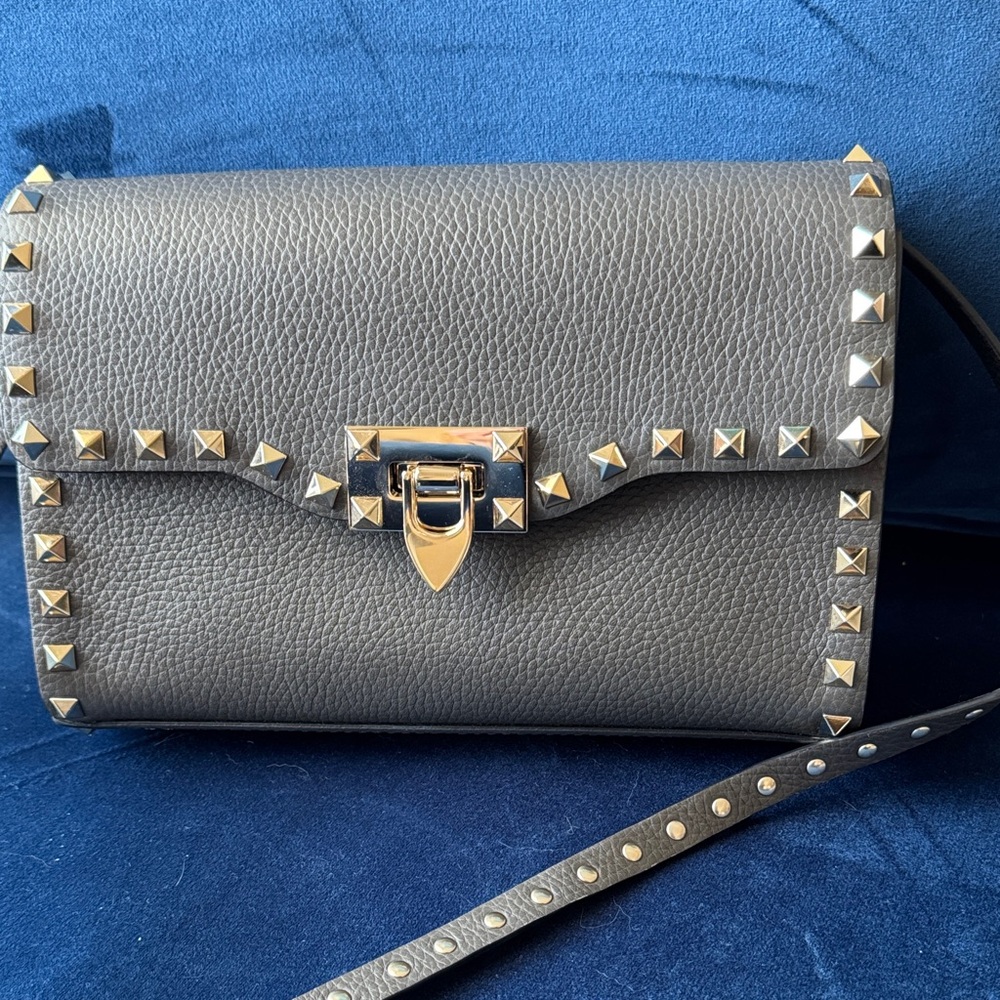 Elegant Studded Leather Crossbody Bag in like new condition.